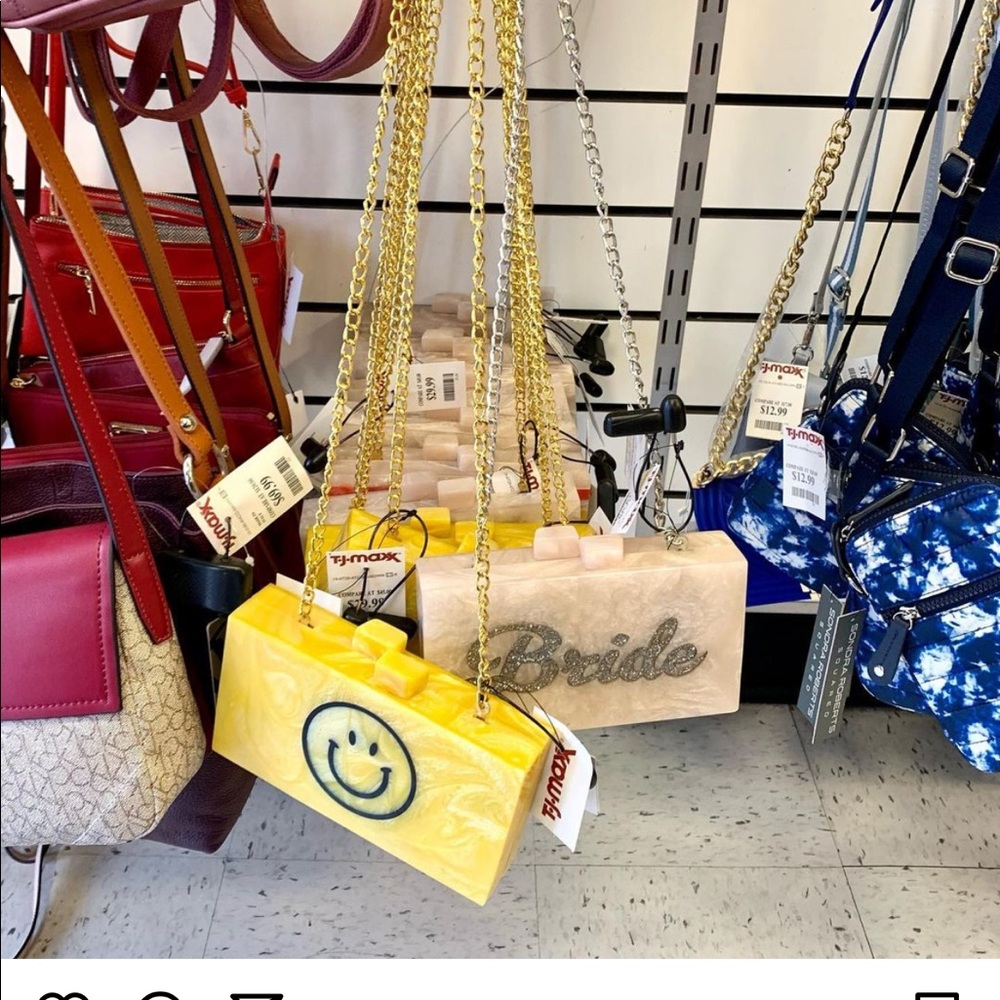 ISO!!! Yellow smiley face clutch